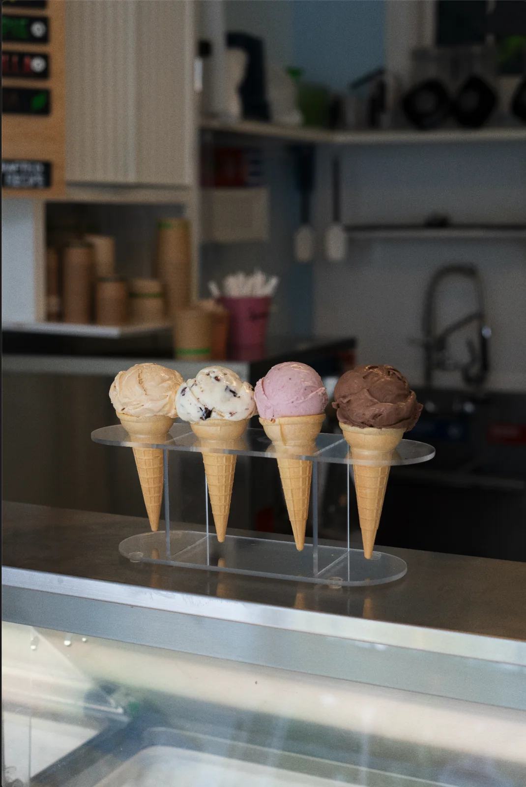 Four handmade ice cream cones in the shop